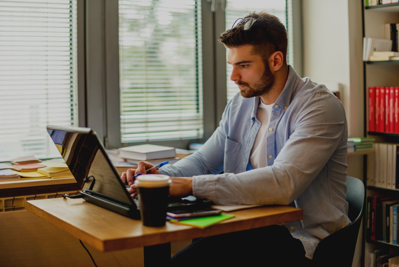 Male student learning online